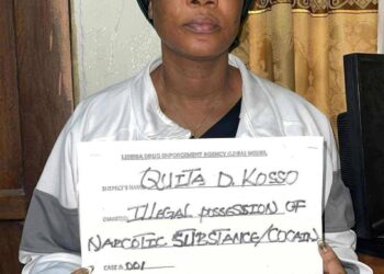 Quita Dolo Kosso appears before the 13th Judicial Circuit Court in Kakata after pleading guilty in a cocaine trafficking case