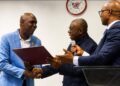 Outgoing Central Bank of Liberia Deputy Governor Musa Dukuly speaks during his farewell ceremony in Monrovia.