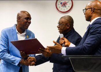 Outgoing Central Bank of Liberia Deputy Governor Musa Dukuly speaks during his farewell ceremony in Monrovia.