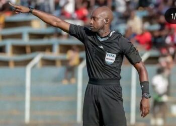 Zambian referee Hillary Hambaba officiates an international football match