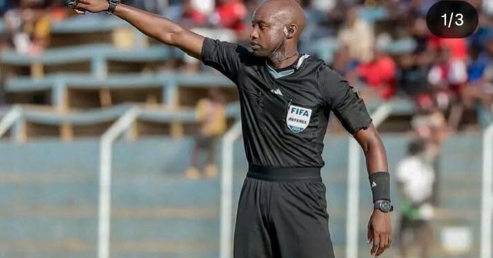 Zambian referee Hillary Hambaba officiates an international football match