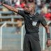 Zambian referee Hillary Hambaba officiates an international football match