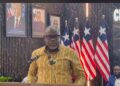 Information Minister Jerolinmek Piah speaking at a government press briefing