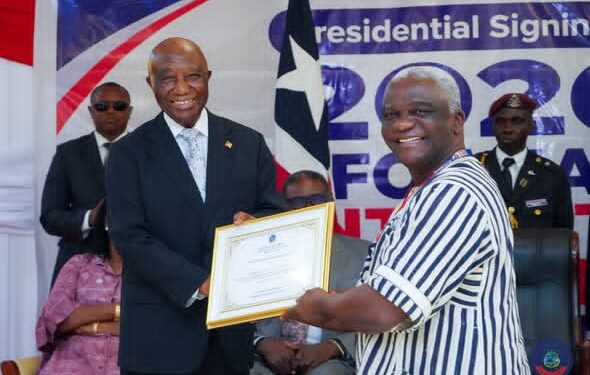 President Joseph Boakai and LRA Commissioner General James Dorbor Jallah