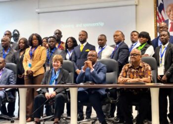 Central Bank of Liberia officials and stakeholders validate the national financial inclusion strategy