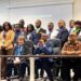 Central Bank of Liberia officials and stakeholders validate the national financial inclusion strategy