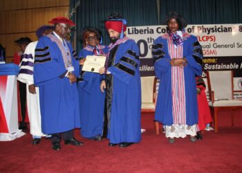 Liberia College of Physicians and Surgeons leaders confer an honorary fellowship on Upjit Singh Sachdeva