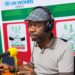 Garrison Doldeh Yeanue speaks to reporters about political tolerance and employment in Nimba County