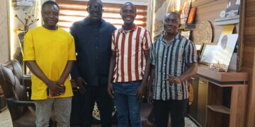 Cole Bangalu meets officials of the Liberia Deaf Sports Association in Congo Town