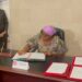 Foreign Minister Sara Beysolow Nyanti signs the African convention on child soldiers in New York