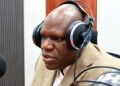 CMC policy director Jacob Jallah discusses Liberia’s US$1 billion fiscal milestone during a radio interview
