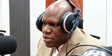 CMC policy director Jacob Jallah discusses Liberia’s US$1 billion fiscal milestone during a radio interview