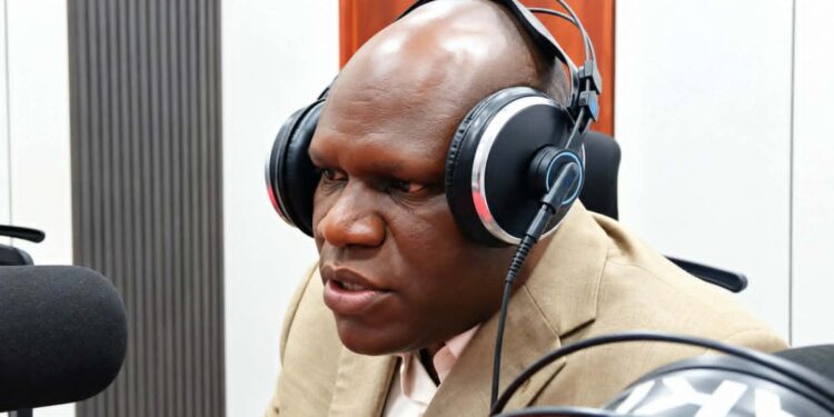 CMC policy director Jacob Jallah discusses Liberia’s US$1 billion fiscal milestone during a radio interview