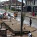 Police clear vendor booths from Rehab Junction in Paynesville