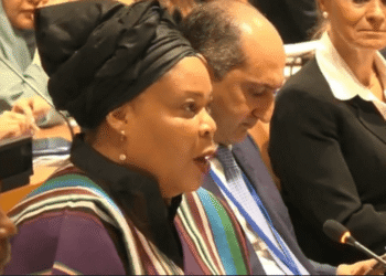 Nobel Peace laureate Leymah Gbowee speaks as President Joseph Boakai listens at a U.N. event in New York