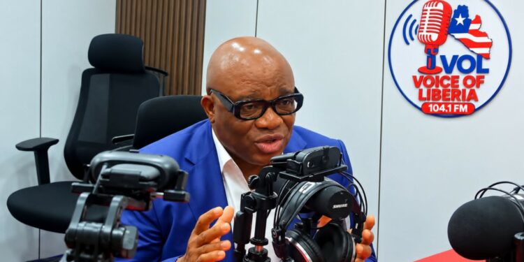 MPC political leader Simeon Freeman speaks during an interview in Monrovia