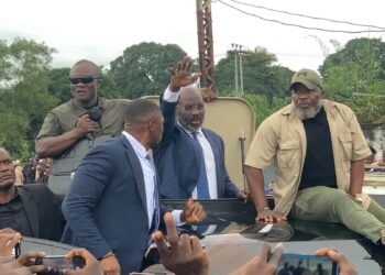 Former President George Weah speaking to reporters at his Paynesville residence