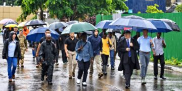 Participants walk through Monrovia during the U.S. Embassy’s 25th-anniversary commemoration of the Sept. 11 attacks