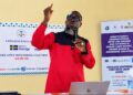 Rep. Sam P. Jallah speaking at a LEMCOL constituency consultation in Bomi County.