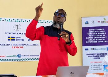 Rep. Sam P. Jallah speaking at a LEMCOL constituency consultation in Bomi County.