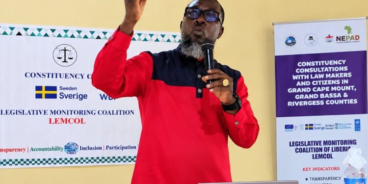 Rep. Sam P. Jallah speaking at a LEMCOL constituency consultation in Bomi County.