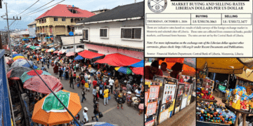 Small traders selling goods in a Monrovia market amid complaints over exchange-rate pricing