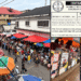 Small traders selling goods in a Monrovia market amid complaints over exchange-rate pricing