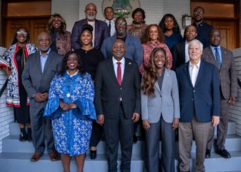 Wala Blegay and Ambassador Al-Hassan Conteh with trade delegation members and Liberian Embassy staff.