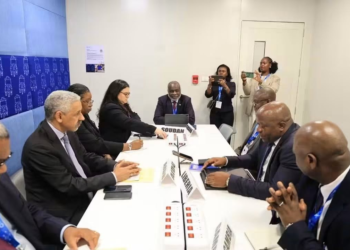 Liberia’s Finance Minister Augustine Ngafuan and AfDB President Sidi Ould Tah at a meeting.