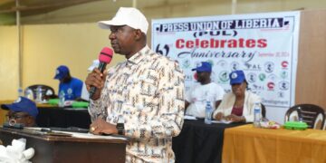 LRA Acting Communications Manager Jerry Laynumah Siakor speaking at PUL’s 62nd anniversary celebration in Monrovia.