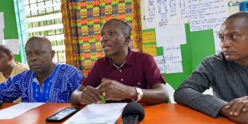 MCSS Teachers Association President Augustine N. Nyormui speaking at a news conference in Monrovia.