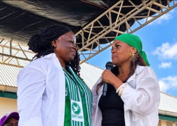 Charlyne Brumskine and Nyonblee Karnga-Lawrence at a Liberty Party ceremony in Buchanan.