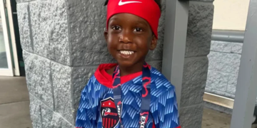 Three-year-old Nevada playing soccer.