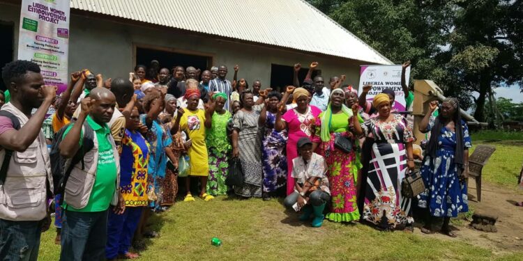 Women attending a savings group meeting in Commonwealth District, Grand Cape Mount County.