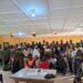 Participants and CJPS executives pose for a group photograph at a meeting in Gbarnga.